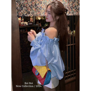 ĐẦM MIDI ĐEN DÂY CHÉO CỔ XẺ ĐÙI