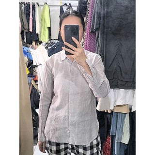 Áo u.n.i.q.l.o size M L nhỏ