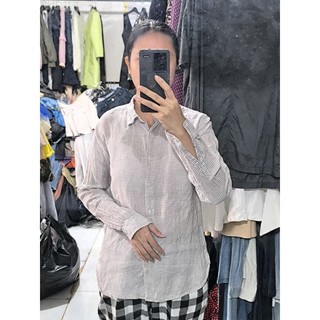 Áo u.n.i.q.l.o size M L nhỏ