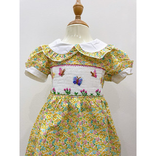 Váy Smocking Cổ Sen Hoa Nhí Vàng Thêu Bướm Nata Smock