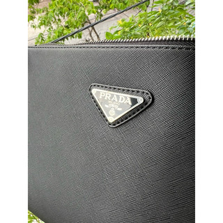 Clutch cầm tay P-RA-DA da thật