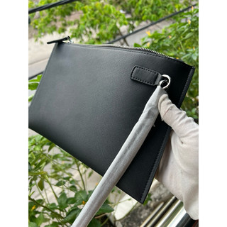 Clutch cầm tay P-RA-DA da thật