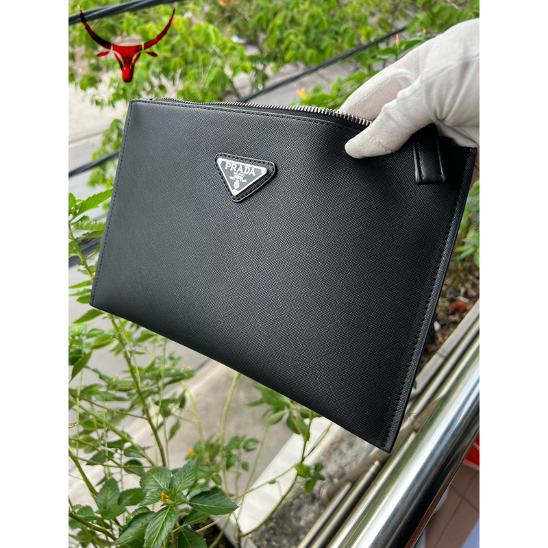 Clutch cầm tay P-RA-DA da thật
