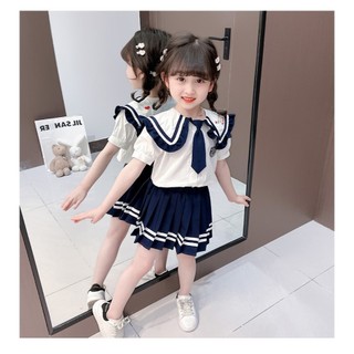Set áo sơ mi thủy thủy thêu thỏ carot mix chân váy dập ly cho bé gái 8-26kg