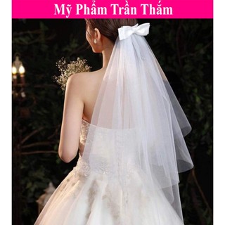 Voan cô dâu đội ngày cưới và chụp ảnh