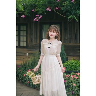 Sơmi cổ bèo phối ren đính 2 nơ