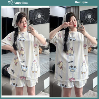 Set nữ gồm áo phông from rộng tay lỡ mix cùng quần sooc cộc hoạ tiết vịt mimi nổi bật