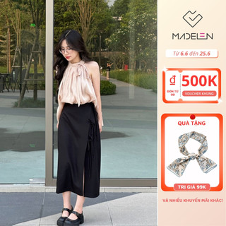 Chân váy đen chữ a dáng dài xẻ trước 3 nơ madelen