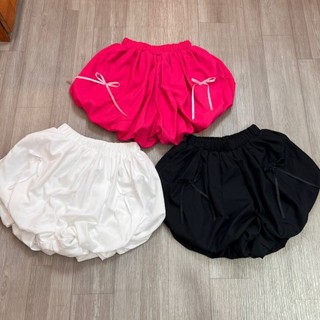 Quần short bí phồng đính nơ lưng thun