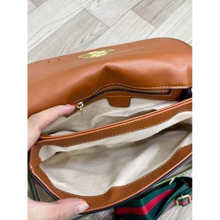 Túi dáng bầu ( cod 12 số_ size  27_ còn nâu)