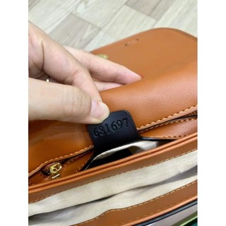 Túi dáng bầu ( cod 12 số_ size  27_ còn nâu)