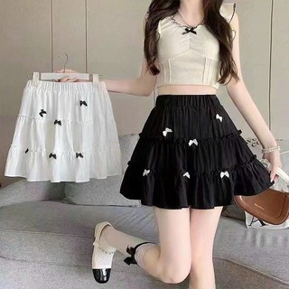 Chân váy xoè tầng đính nơ vải xốp