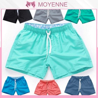 Quần short đi biển mùa hè nam khô nhanh màu trơn