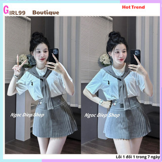 Set bộ gồm 3 món áo phông hoạ tiết ngưc phối cùng chân váy xếp ly kèm khăn buộc