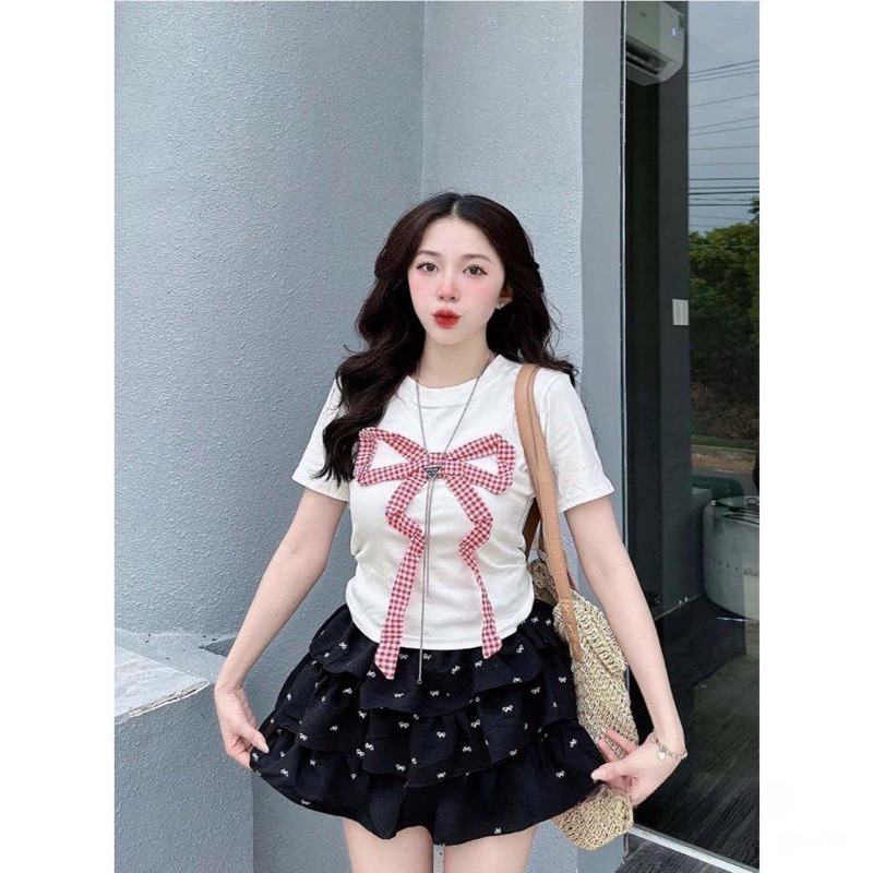 Sét áo tay ngắn phối nơ và chân váy in nơ