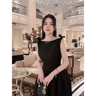 Đầm xoè gấm nơ vai