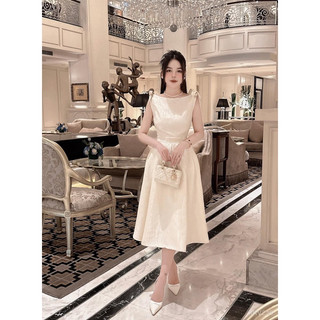 Đầm xoè gấm nơ vai
