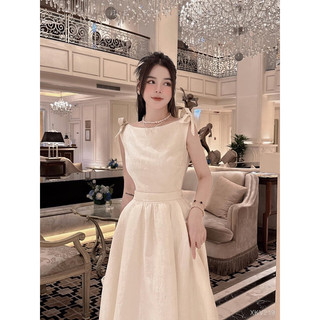 Đầm xoè gấm nơ vai