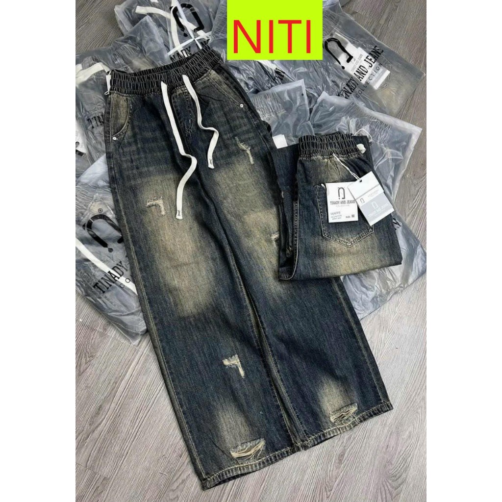 QUẦN JEANS ỐNG RỘNG NỮ LƯNG THUN DÂY TRẮNG RÁCH NHẸ ĐÙI MÀU XANH ĐẬM PHỦ VÀNG LAI CUỐN