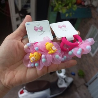 Một cặp thun cột tóc nơ/hoa cho bé