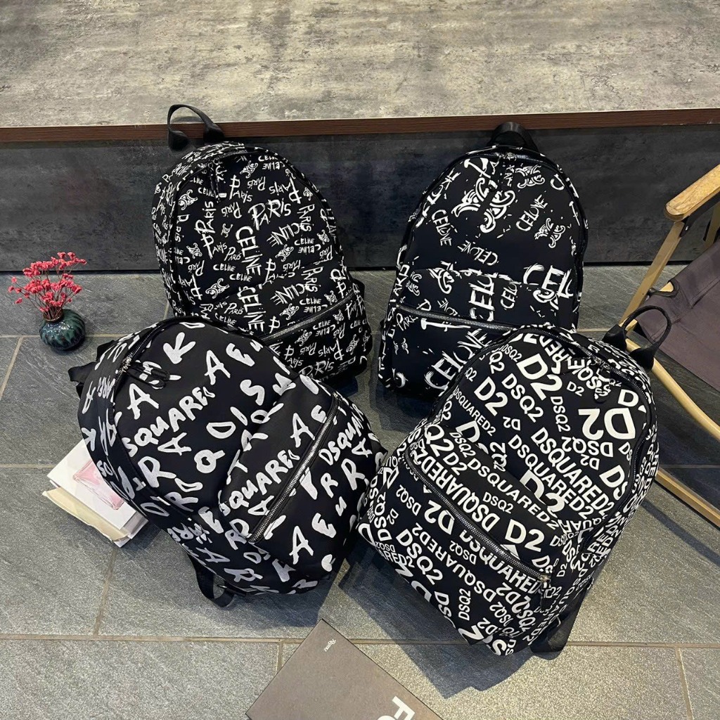 Balo DSQ đi học nam nữ- Cặp Dsq2 đen in hoạ tiết chữ trắng kiểu dáng đơn giản