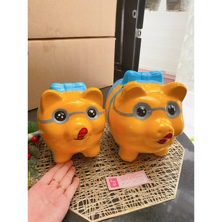 Heo Đất Nơ vẽ Minion, chất liệu đất nung, nước sơn Bạch Tuyết, sản phẩm thủ công 100%
