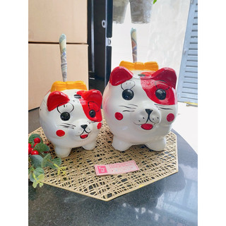 Heo Đất Nơ vẽ hình Mèo đỏ, đất nung, sơn Bạch Tuyết, ống tiết kiệm thủ công handmade 100%