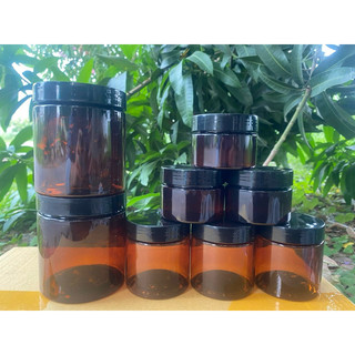 Hủ nhựa PET thân nâu nắp đen.