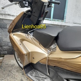 Cục nệm ngồi xe máy cho bé