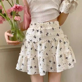 Chân váy xòe ngắn phối bèo in nơ nhí dễ thương
