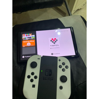 Nintendo swich oled hắck ám màu trắng