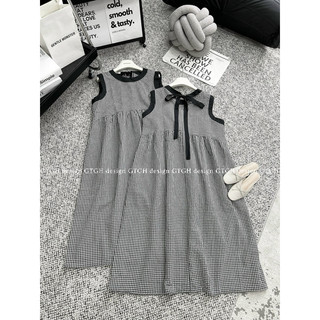 Váy kẻ caro sát nách nơ lưng
