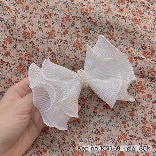 Kẹp nơ viền xoăn style tiểu thư