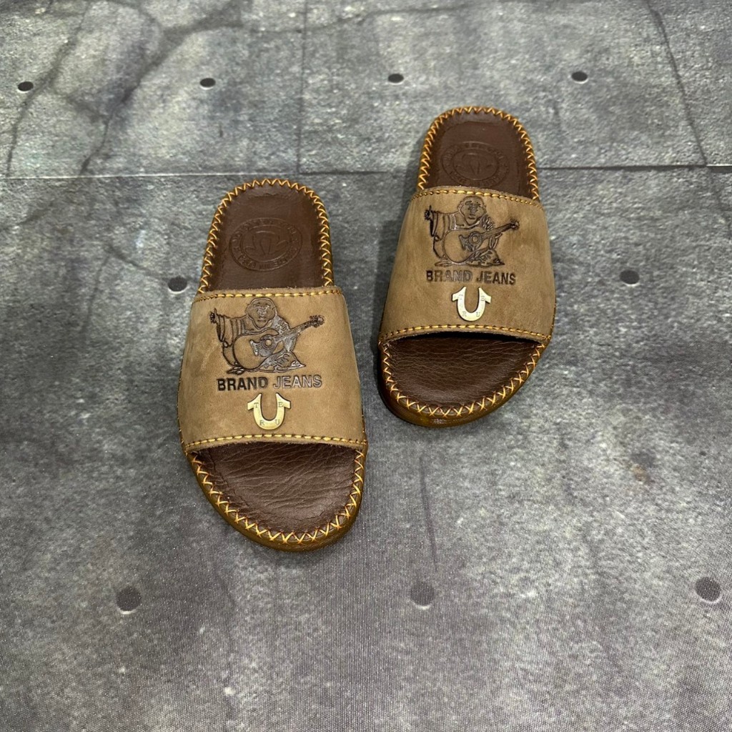 Dép da nam quai ngang ông địa da bò khuy u