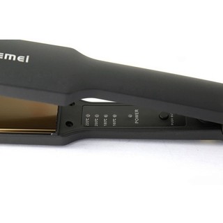máy duỗi tóc kemei 329 có 4 mức chỉnh nhiệt
