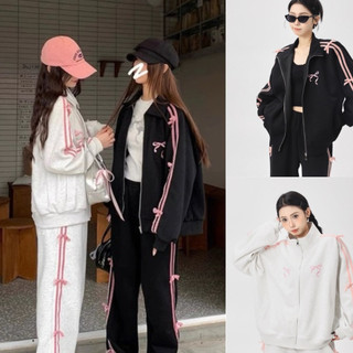 Áo khoác nỉ cổ cao phối viền sọc đính nơ hồng phong cách cực đẹp hot hit hiện nay