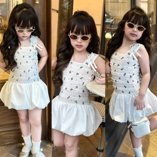 Váy nơ chân phồng bé gái