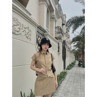 D.chic áo cổ bẻ vạt cong 2 túi cơi ms: 1812510