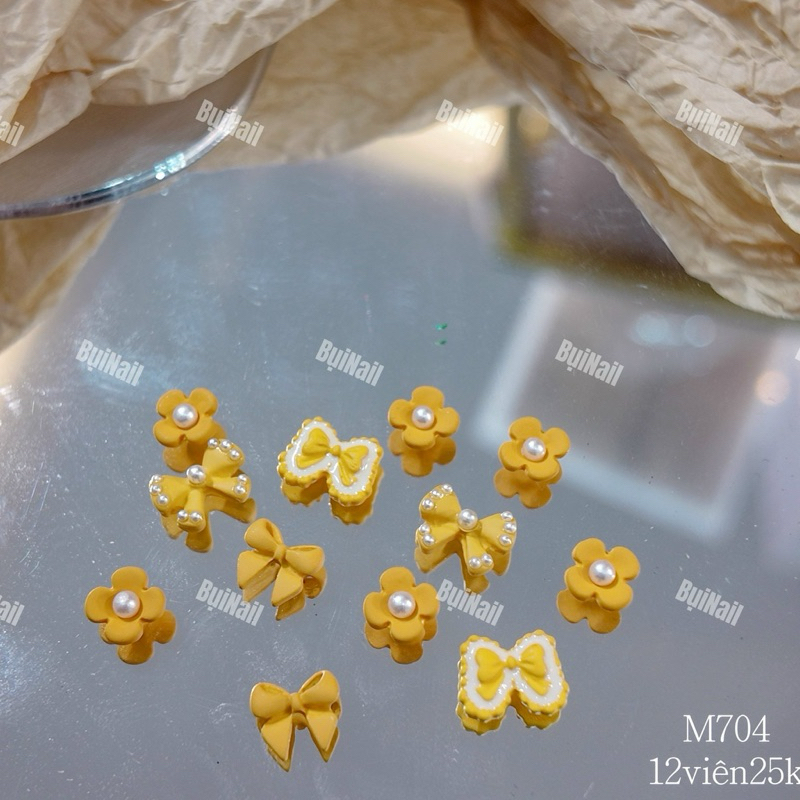 CHARM NƠ VÀNG SET 12 VIÊN M704
