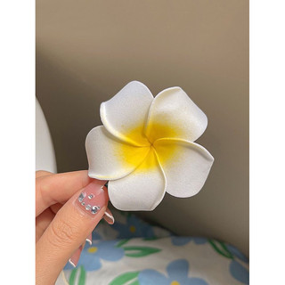 Kẹp hoa sứ trắng cài tóc đi biển