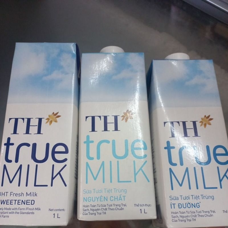 Sữa Th true milk 1 lít nguyên chất, ít đường, có đường