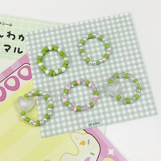 Nhẫn hạt cườm tone màu xanh lá - Chew