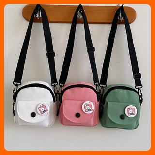 Túi chéo đeo vai nữ mini cute vải canvas trơn nhiều màu xinh tặng ghim cài gấu đi chơi đẹp giá rẻ
