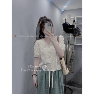 Áo thô boy thêu hoa cổ V