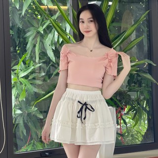 Chân váy ngắn xòe 2 tầng phối dây nơ buộc chất vải thô thoáng mát có lót quần Hottrend hè 2024. Nữ