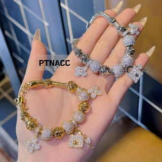 Vòng tay, lắc pandora phối charm cỏ 4 lá đính đá sang trọng dành cho nữ, hk xi bạch kim . PTNACC
