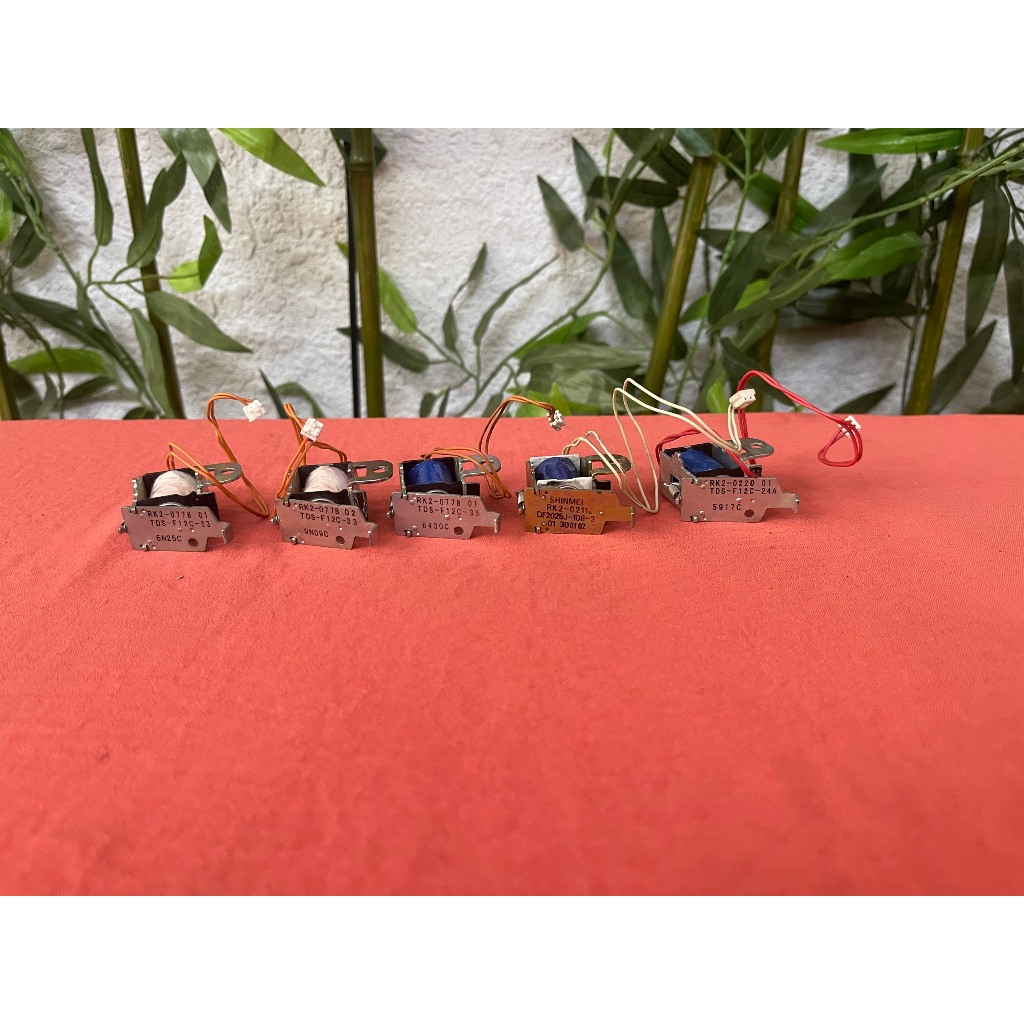 Rờ le lấy giấy máy in canon 2900/canon 3000