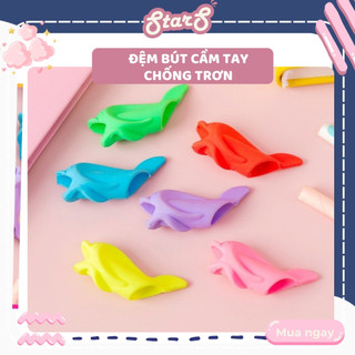 Đệm bút tập viết cầm tay định vị chống trơn trượt hình con cá heo cho bé tập viết