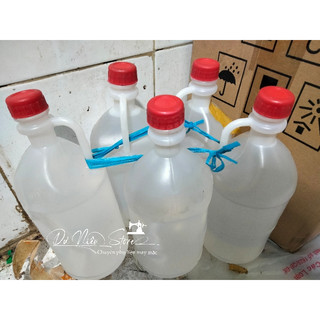 Dầu trắng may may 1 lít tặng kèm 1 bình chiết dầu.