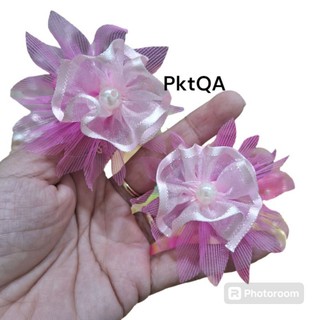 Một cặp thun cột tóc đính hoa cho bé